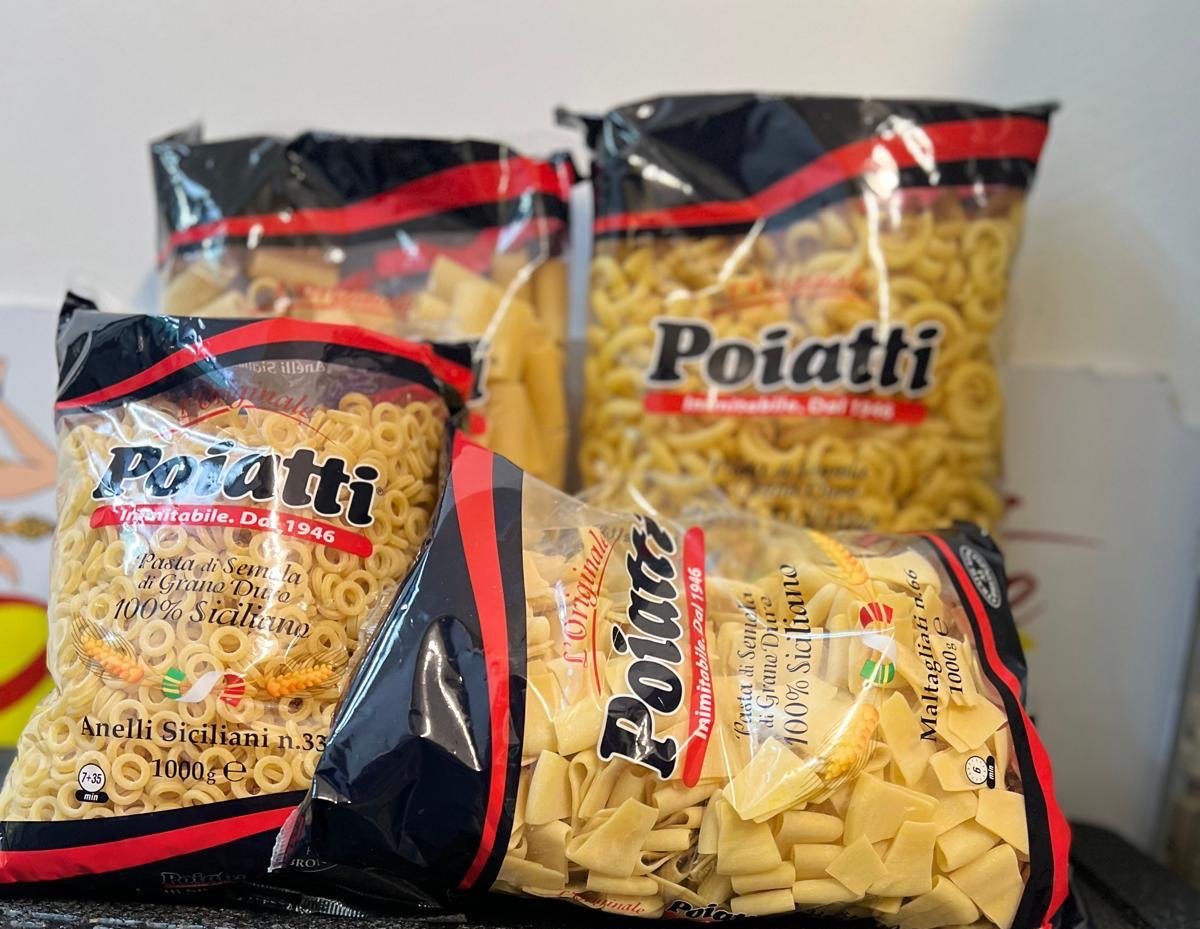 Quattro buste trasparenti nere e rosse di pasta Poiatti, tra cui Anelli Siciliani n.33 e Maltagliati da 1000 g